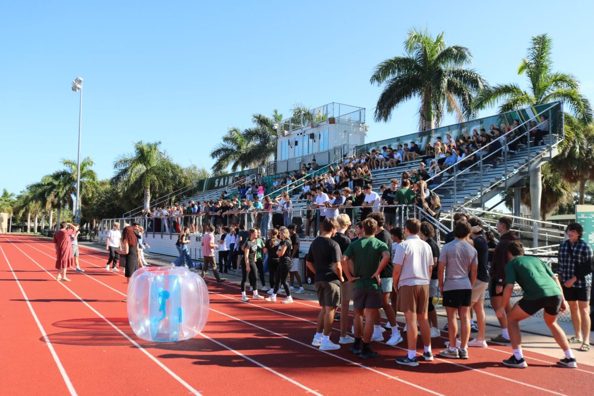 Upper School Falcons wait in anticipation for the sumo wrestling event to begin, a new event here at Saint Stephen's.

