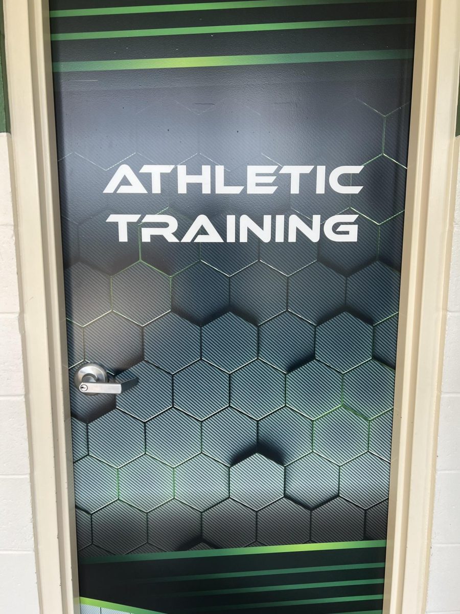 Door with a new covering that says Athletic Training. 