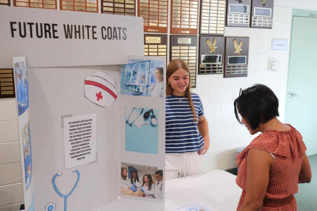 Mrs. Conn checked out the Future White Coats Club, started by Christina Collazo '25. 