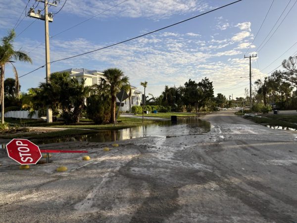 Streets are flooded and many signs are knocked down on AMI.