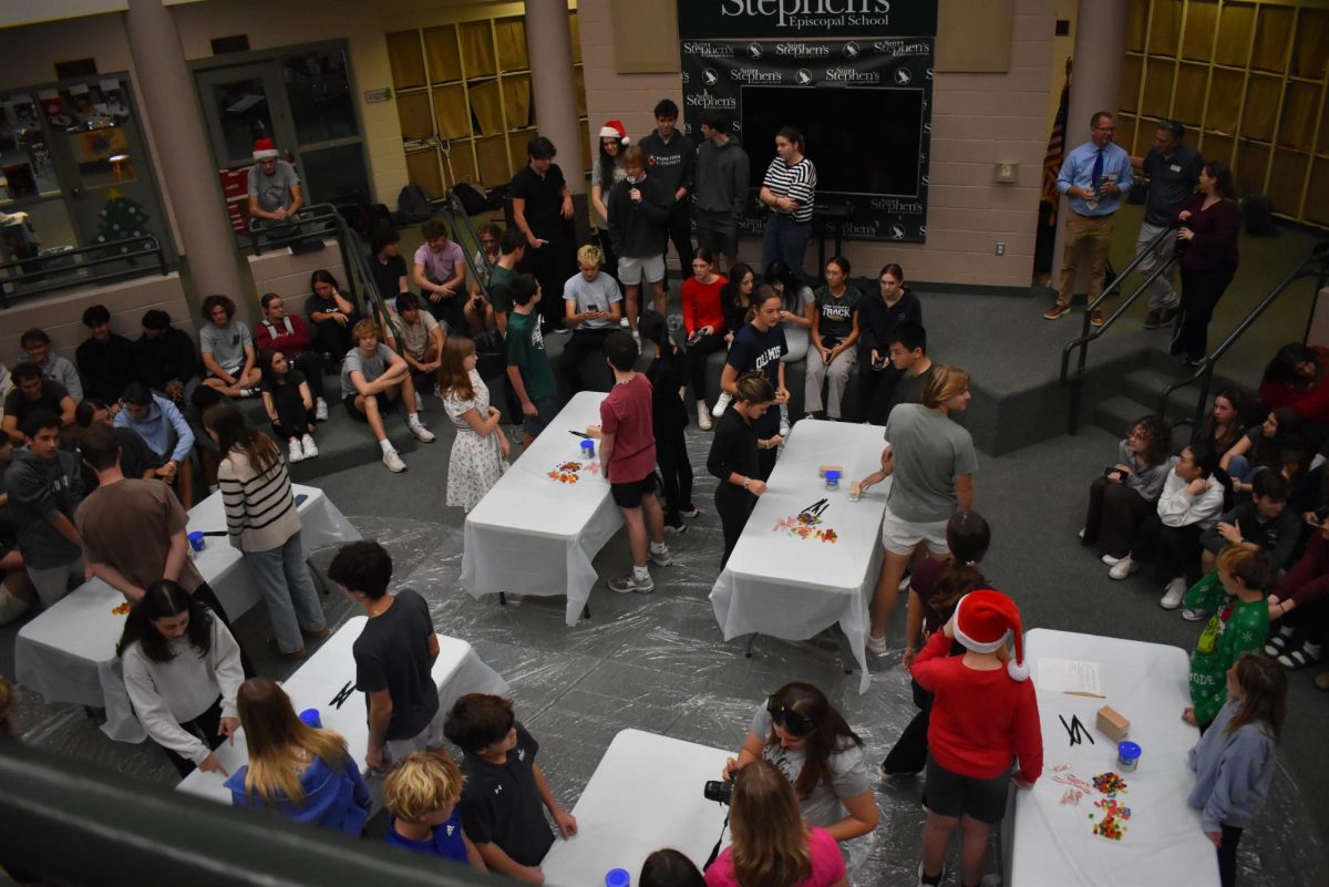 A long-shot of the competition tables and onlookers.  The event took place in the US Commons with at least 300 students in attendance. 