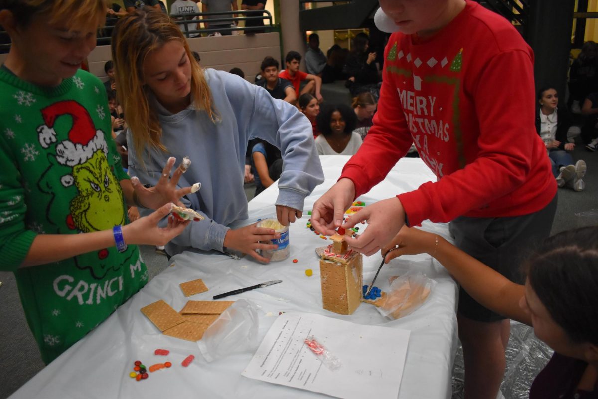 The 7th graders debut their gingerbread house-making skills, the first year ever for MS competitors in the annual contest. 